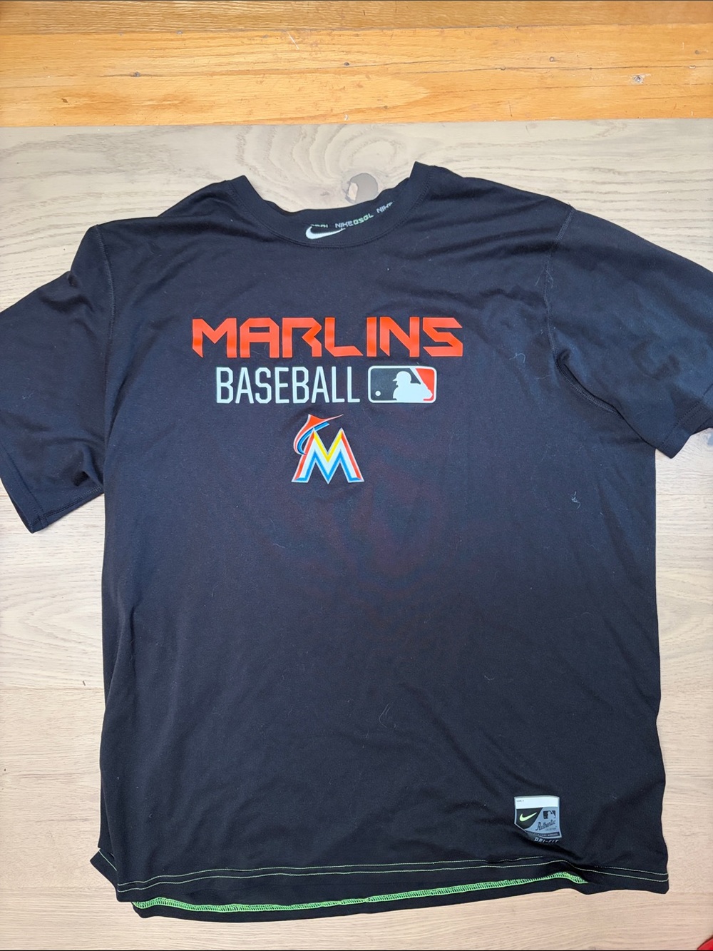 Nike Black Marlins Baseball Tee with Orange & Teal Logo